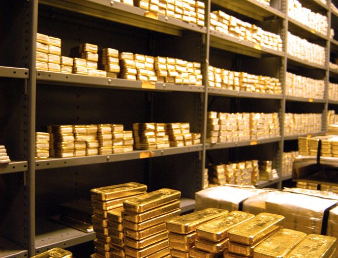 Stacks,Of,Gold,Bars,In,Storage,In,A,Bank,Vault