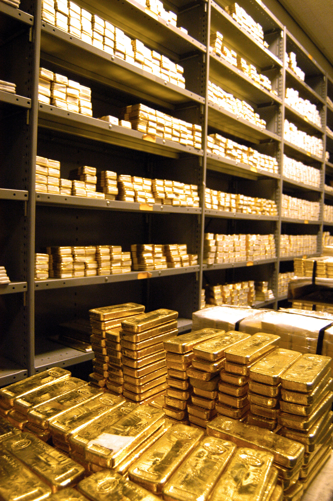 Stacks,Of,Gold,Bars,In,Storage,In,A,Bank,Vault